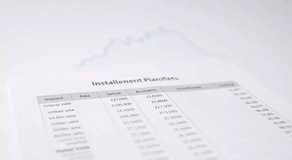 Empréstimo com Débito em Conta: Conveniência que Pode Virar Armadilha 2 Taxas de Juros e Condições de Parcelamento